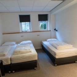 Schlafzimmer im barrierefreien Gruppenhaus Nieuwe Brug in den Niederlanden