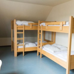 Schlafzimmer im deutschen Ferienhaus für Gruppen Schotten.