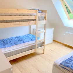 Schlafraum im Freizeitheim Skovly Langeland für Kinder und Jugendliche in Dänemark