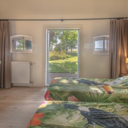 Schlafzimmer im Gruppenhaus De Eek für behinderte Menschen in den Niederlanden